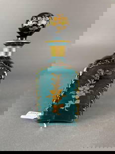 Teal blue decanter Baccarat: vintage decanter with ground stopper and pontil  Low Estimate: 20.00 High Estimate: 40.00