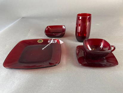 68 pcs. 1950's square ruby red luncheon dishes: 8 glasses, 12 cups, 20 desert bowls, 14 saucers, 14 luncheon plates. Some with original stickers "royal ruby anchor glass"  Low Estimate: 20.00 High Estimate: 100.00