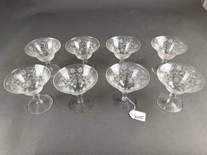 Set of 8 floral etched crystal stems: 4-1/4" tall Low Estimate: 20.00 High Estimate: 40.00