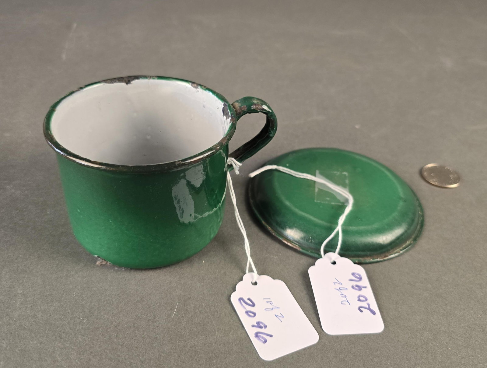 Green banded cup and advertising saucer: 3" Low Estimate: 15.00 High Estimate: 20.00
