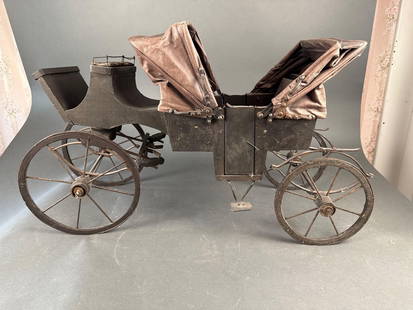 Landau coach spoke wheels: 31" x 18"  Low Estimate: 50.00 High Estimate: 150.00
