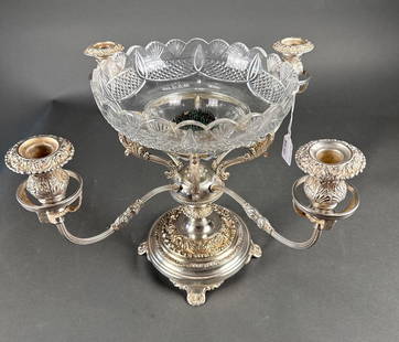 Large silver center piece with cut glass center bowl: 20" diameter and 13" high  Low Estimate: 200.00 High Estimate: 400.00