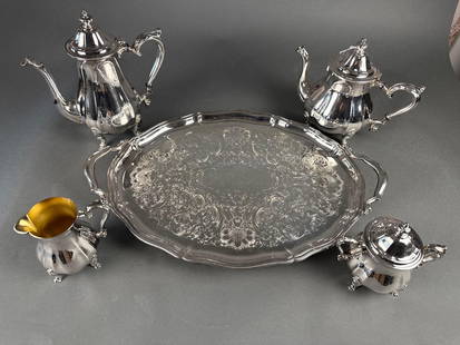 5 piece silver plate tea set: tray, coffee, tea, creamer and sugar  Low Estimate: 50.00 High Estimate: 100.00