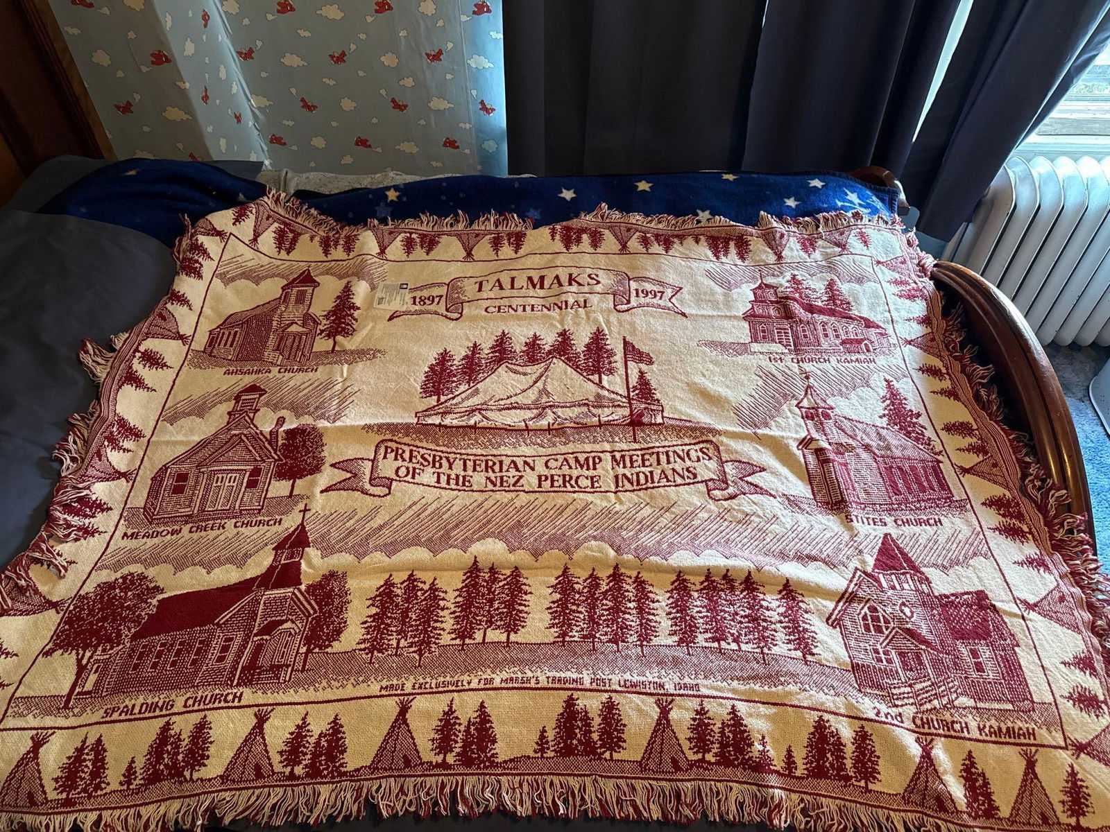 Talmaks centennial throw, new in plastic: red with all the Presbyterian churches on it Low Estimate: 20.00 High Estimate: 60.00