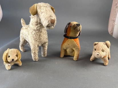 4 antique straw stuffed dogs, 1920-30s era: 4 antique straw stuffed dogs, 1920-30s era Low Estimate: 10.00 High Estimate: 30.00