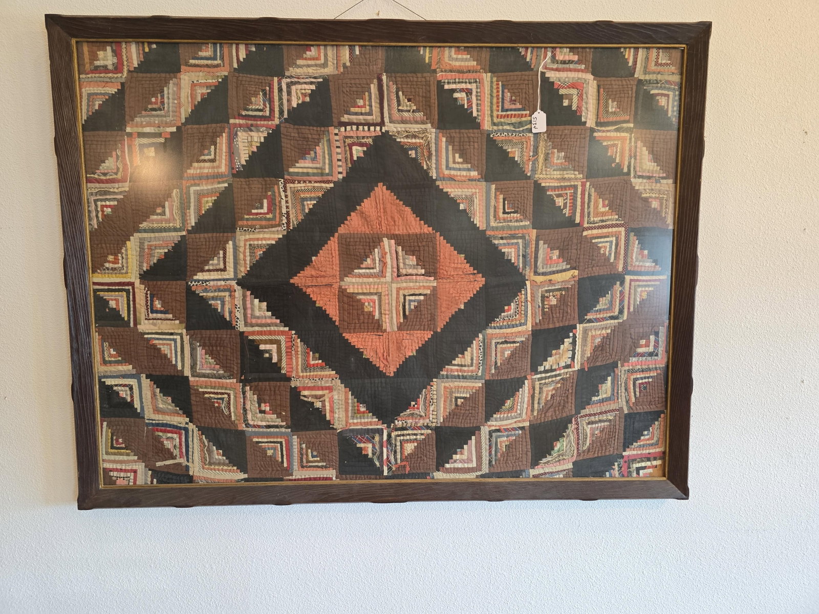 Quilt in frame, log cabin: 51" x 39" Item is located at 1105 36th St. N, Lewiston, ID Low Estimate: 20.00 High Estimate: 45.00