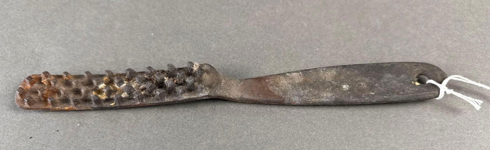 Tool labeled Tony's fish scaler, Weippe, Idaho: 9" long Low Estimate: 5.00 High Estimate: 20.00