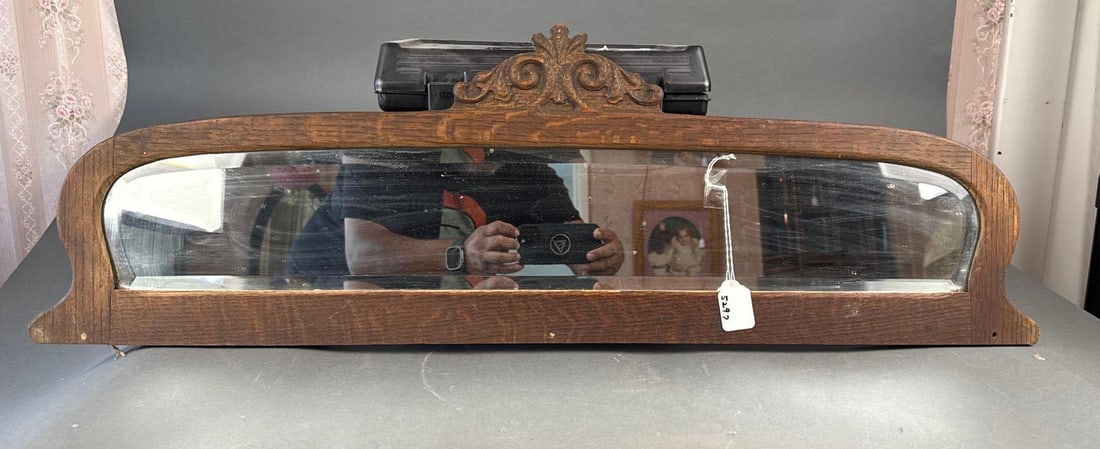 Carved oak mirror with beveled mirror: 38-1/2" good for a curved front china Low Estimate: 10.00 High Estimate: 20.00