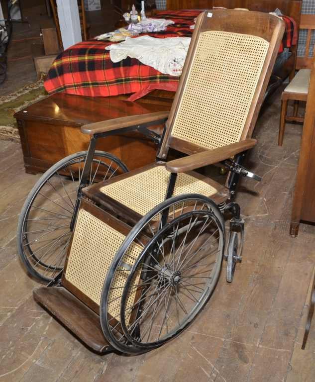 VINTAGE WHEELCHAIR W/ CANE SEAT & BACK, HAS TAG MARKED : VINTAGE WHEELCHAIR W/ CANE SEAT & BACK, HAS TAG MARKED "SEARS & ROEBUCK CO." CATALOG NO. 1574