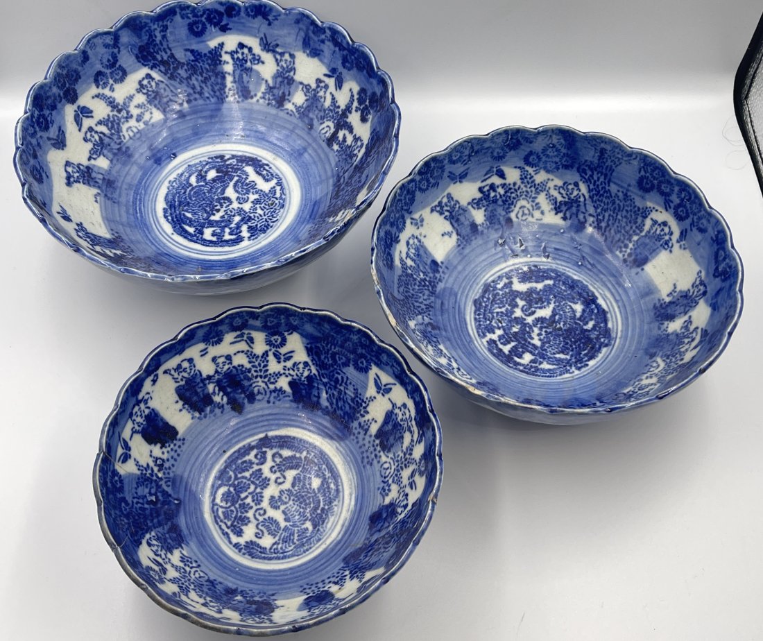 Antique Lot of 3 Nesting Blue & White Chinese Bowls: Three bowls with figures and butterflies. Small bowl has repairs, other two have minor chips. Please see photos. Largest bowl measures 9 1/2" in diameter x 4 1/4" high.