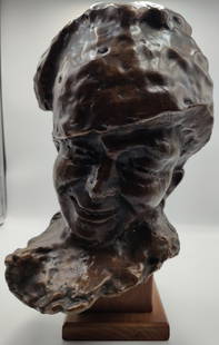 After Medardo Rosso Bronze Bust of Birichino or Gavroche 1/3: After Medardo Rosso (Italy, France, 1858 - 1928) Birichino or Gavroche Bust in Bronze and numbered 1/3. Incised signed M Rosso 1/3 on the side. The sculpture portrays a ragamuffin wearing a beret, wit