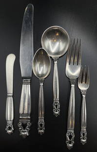 Georg Jensen Acorn Sterling Silver Flatware Set: Service for 8, 6 piece place setting. Dinner fork, cocktail fork, soup spoon, tea spoon, butter knife, dinner knife. Serving pieces to include a carving set, cheese knife, bottle opener, large serving