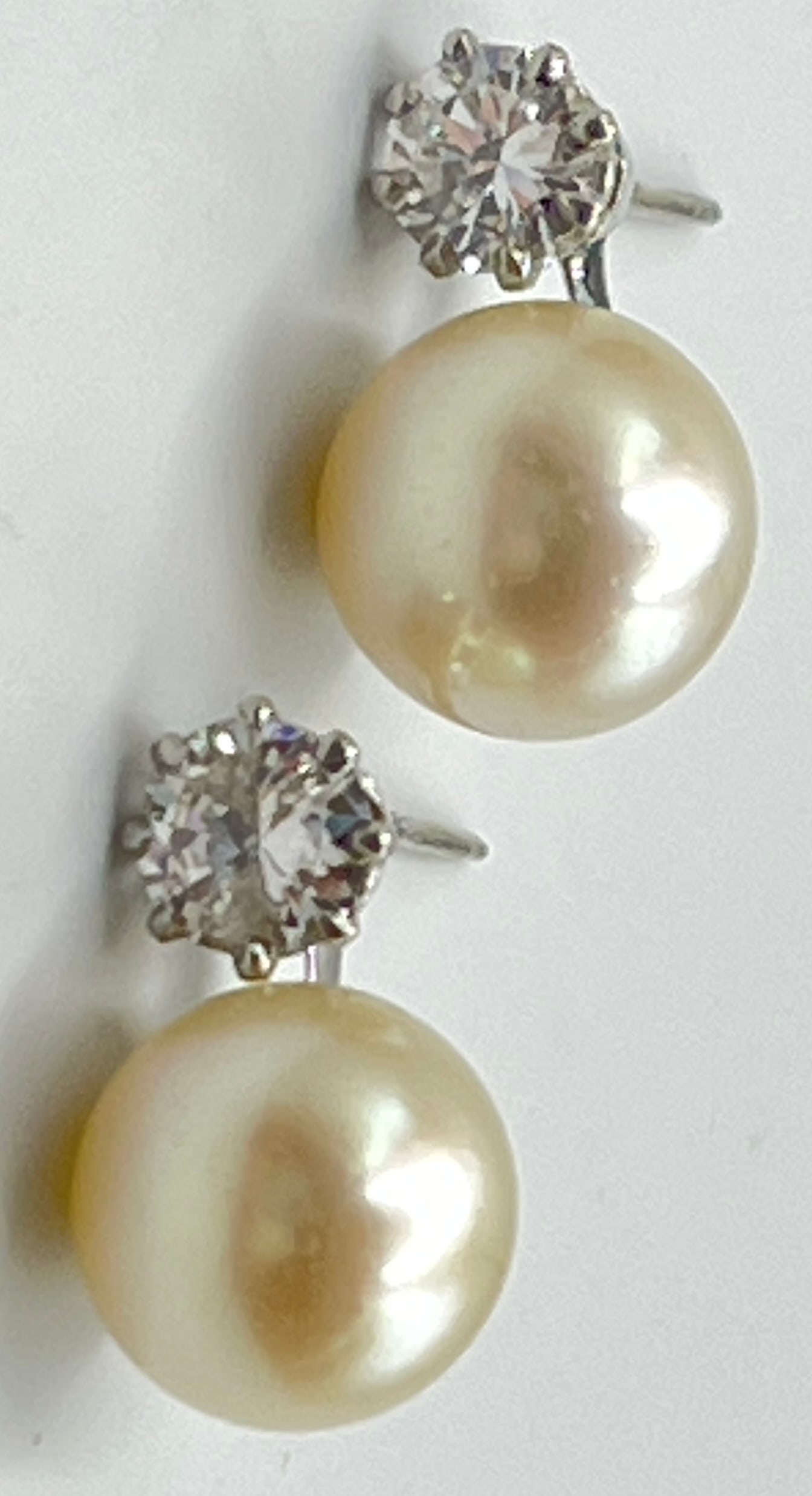 14k White Gold Pearl & Diamond Stud Earrings: Pearls are 7mm wide each, approx .30 carats of diamods each. Total weight 2.3 dwt (3.7 grams).
