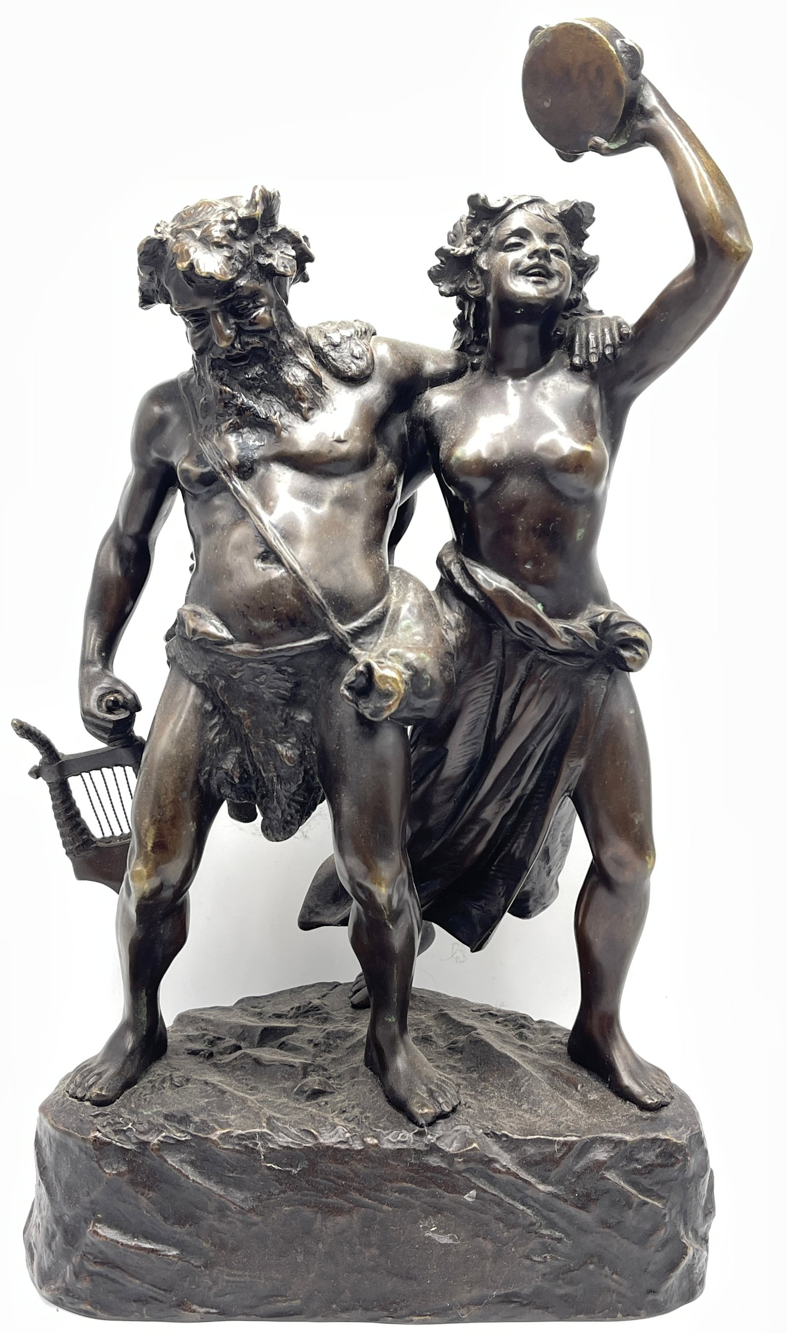 Carl Brose (1880-1914) Bronze titled Happy Bacchae: Bronze titled Happy Bacchae depicting a man and woman with musical instruments. Signature and foundry mark on the base. 17 in high, 10 in long, 6 in wide.
