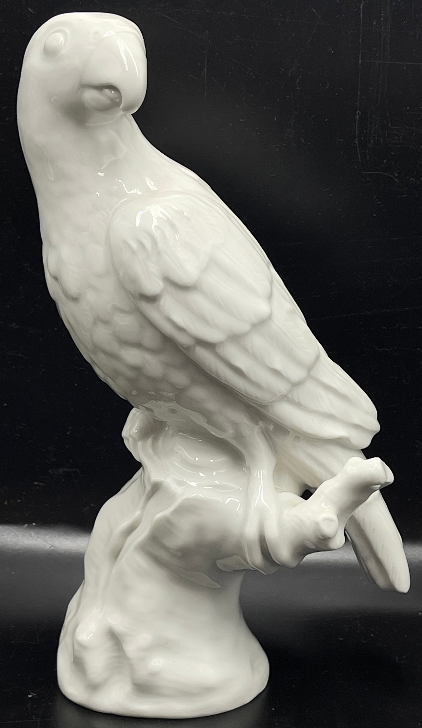 KPM Blanc de Chine Model of Parrot: first half 20th century after an 18th century design by Johann Pedrozzi, stamped on the bottom. 8.75 in. tall. No chips or cracks