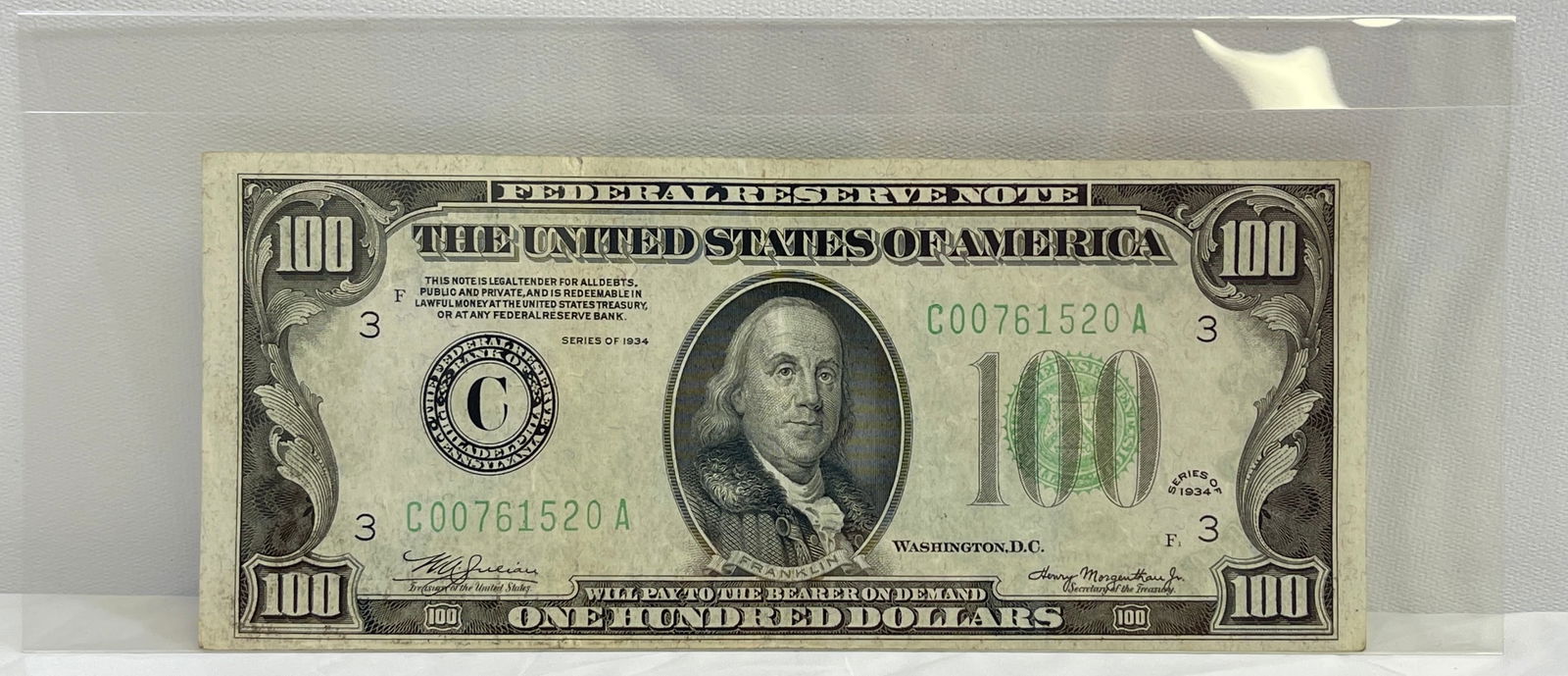 1934 $100 Green Seal Federal Reserve Note, Philadelphia: Bill is slightly off center, margins higher at top than the bottom.