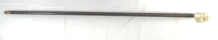 Vintage Inuit Carved Bone Walking Stick Depicting Man in Boat