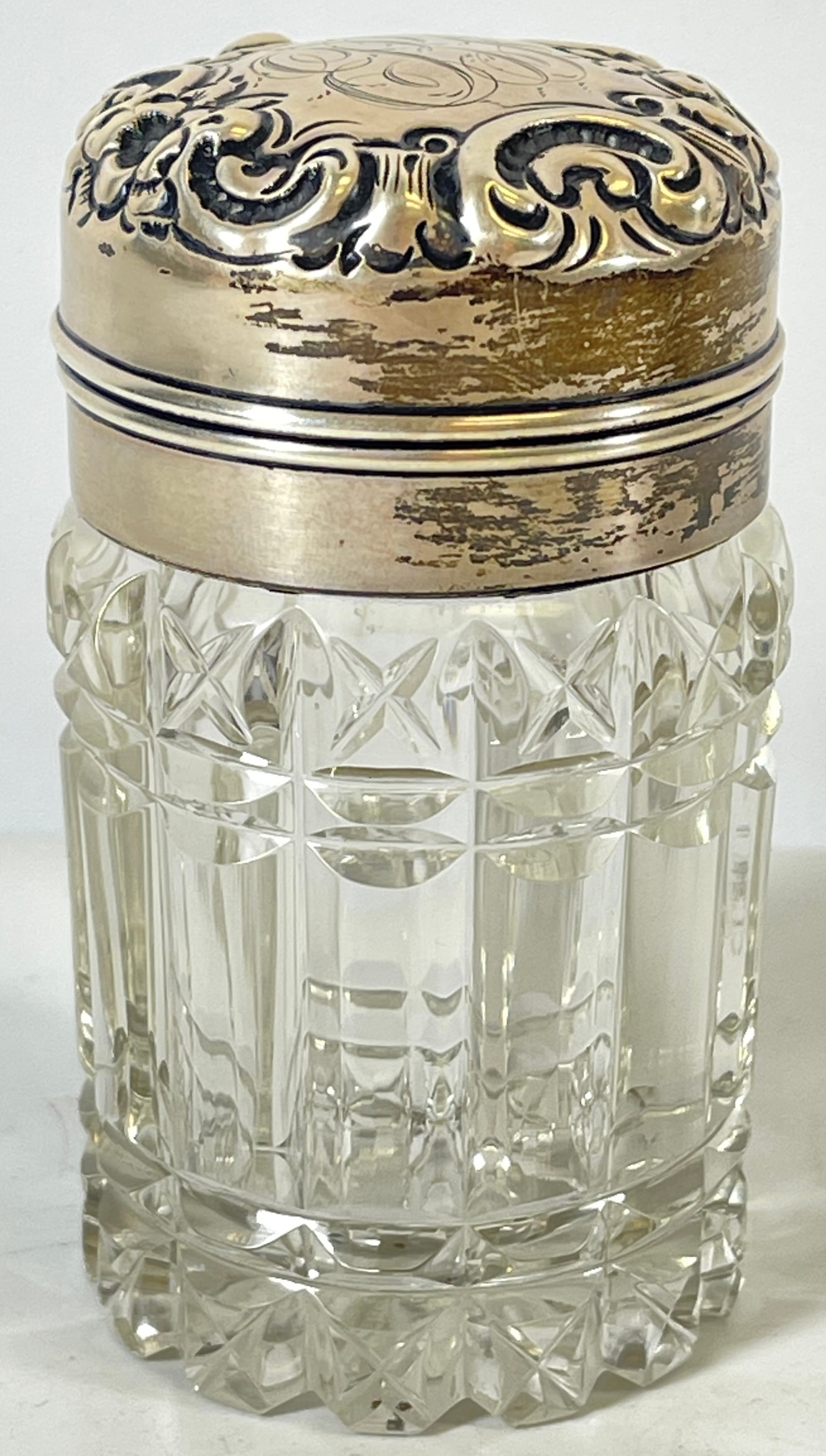 Repousse Sterling Silver & Crystal Dresser Box: Has original crystal stopper. Monogram on top. Overall good condition, no chips or cracks. Measures 3.75 inches high, 2 inches in diameter.