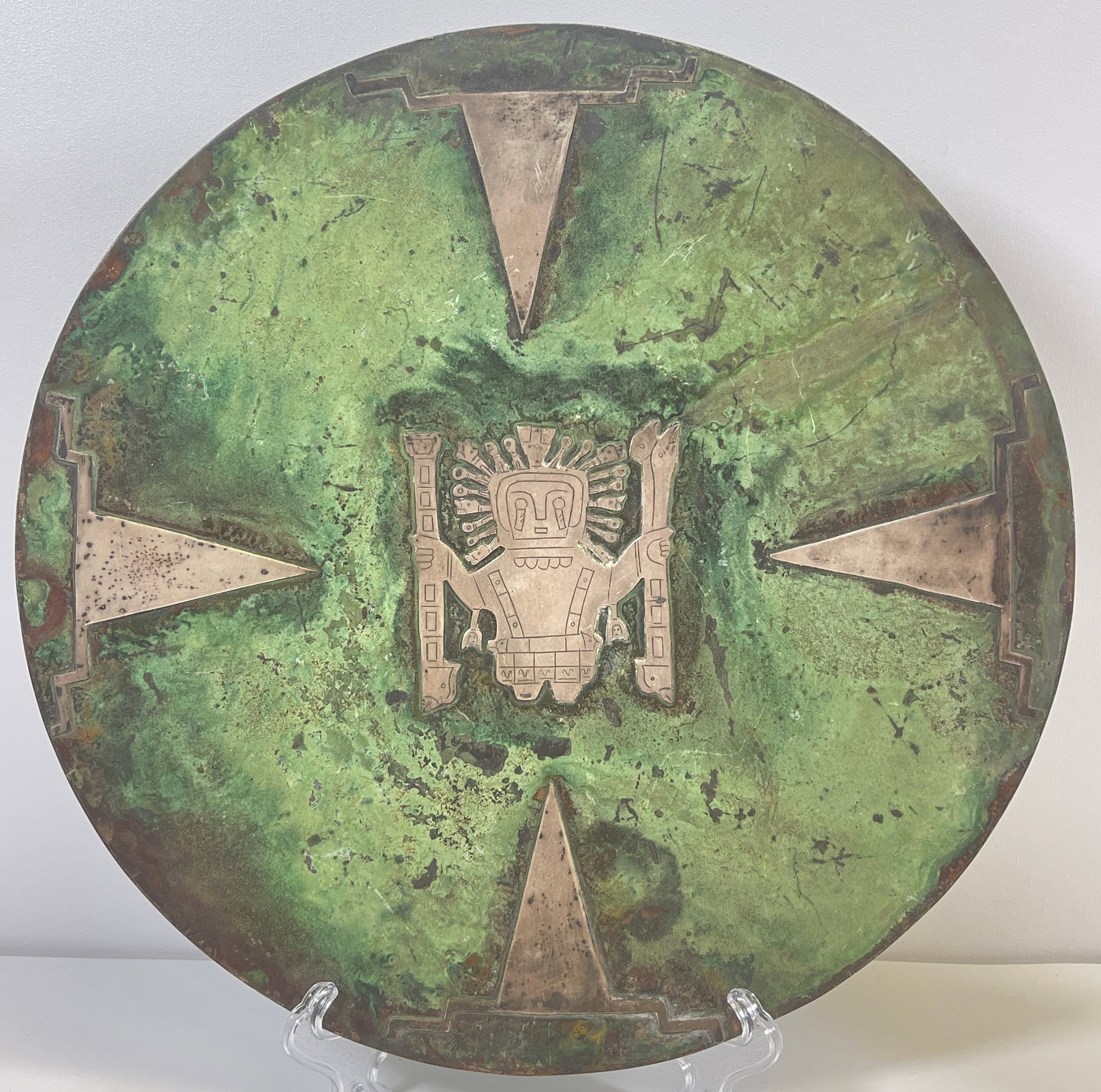 Signed Graziella Laffi Mixed Metal Plate Sterling Copper: Vintage Peru Graziella Laffi copper plate with applied sterling silver, cast with mythical figure motif. Overall good condition. Measures 11.75 inches in diameter.