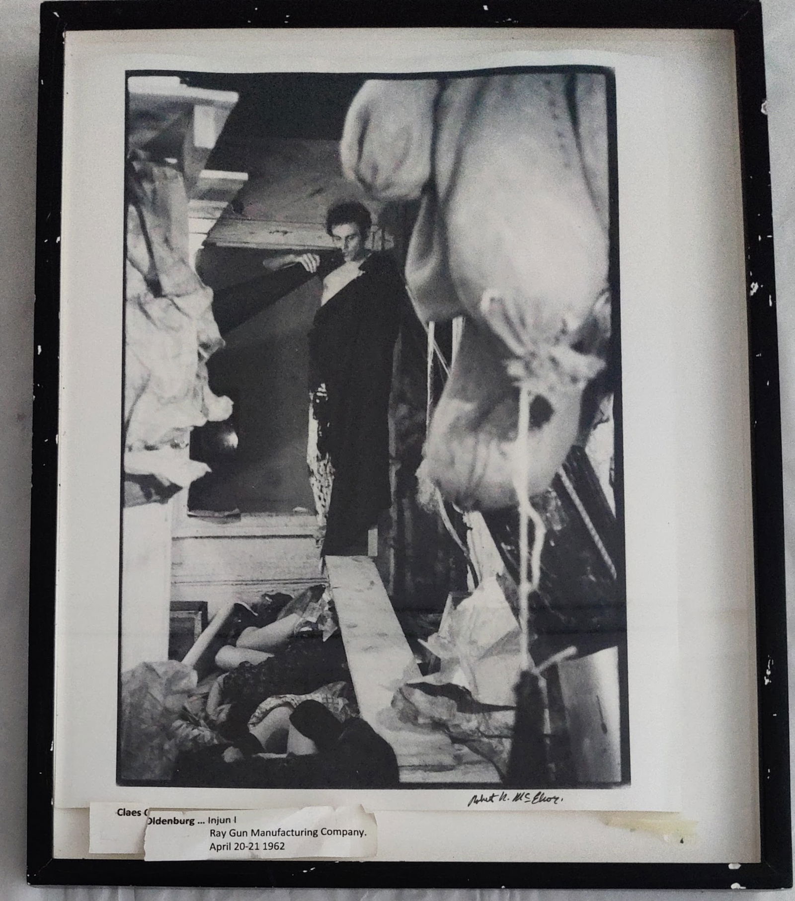 Robert McElroy Photo Claes Oldenburg Ray Gun Manufacturing: Robert Raymond McElroy (Chicago, New York, 1928 - 2012) signed B&W exhibition photograph Item 47, 1-19 SHOW, from the Action/Performance and the Photograph an exhibition circulated by Curitorial Assis