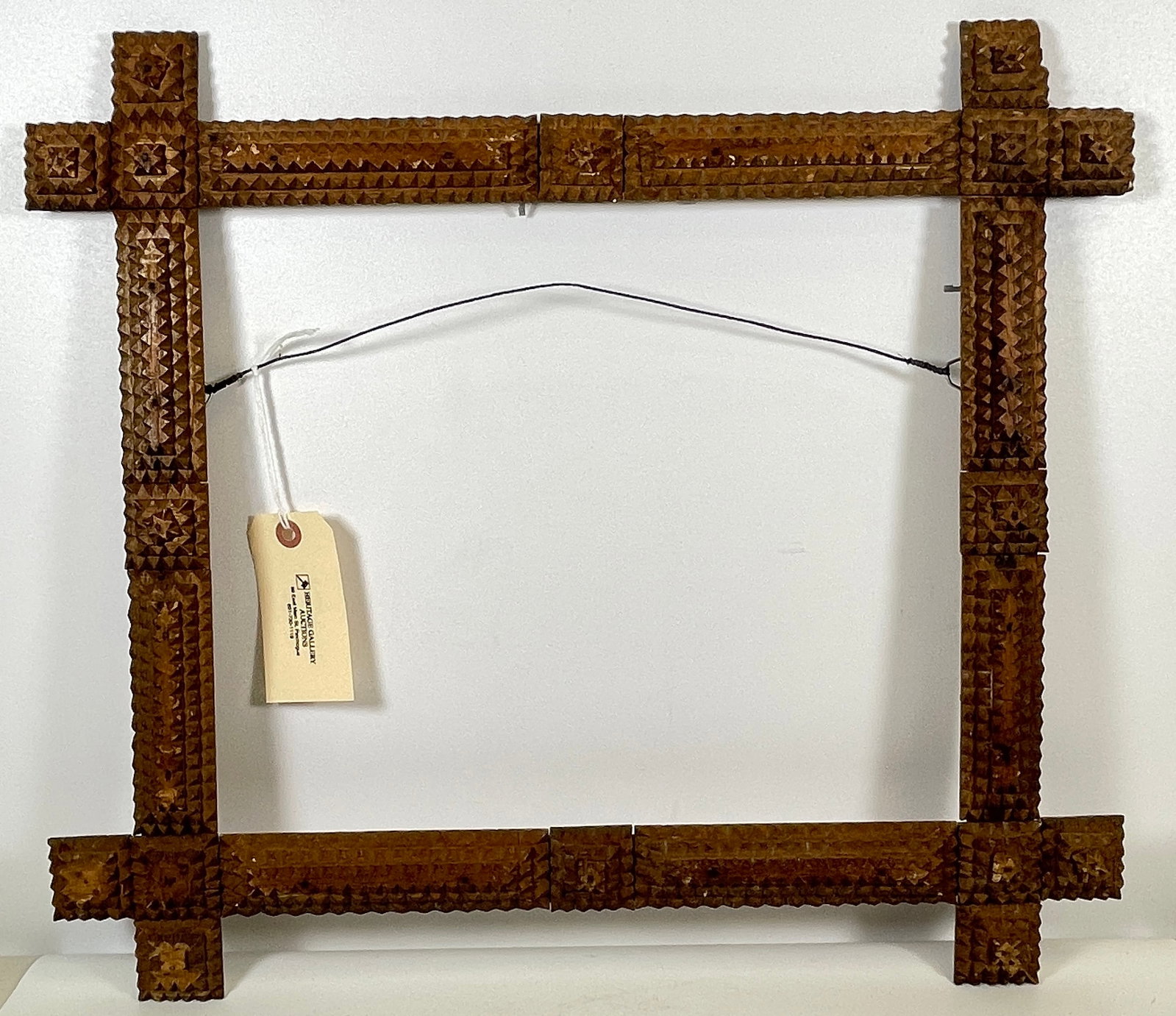 19th Century Tramp Art Frame: Antique tramp art frame, overall good condition. Slight areas of chipping, one corner missing. please see photos.