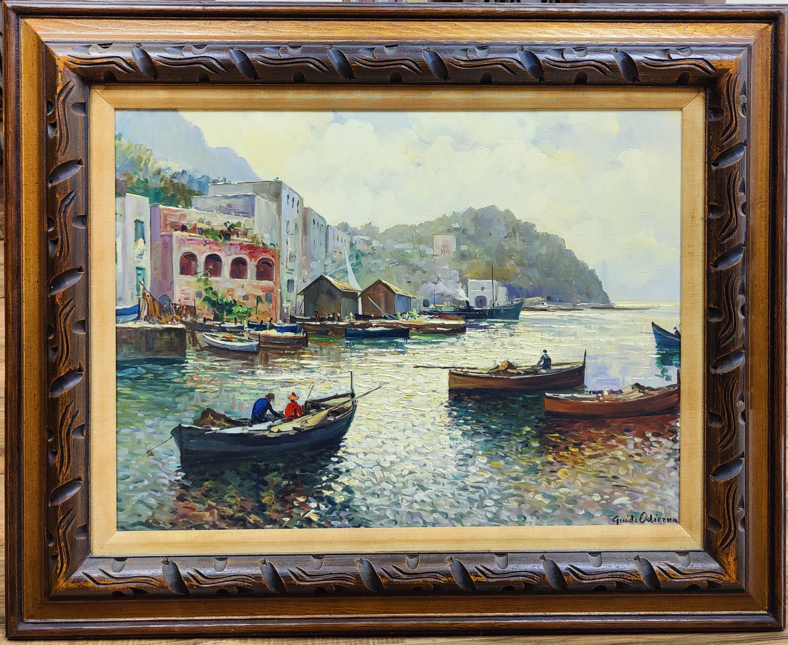 Guido Odierna O/C Painting of the Amalfi Harbour c. 1970s: Guido Odierna (Italy, 1913 - 1991) O/C painting depicting boats on the Amalfi Harbor, Italy. Very good condition and nicely period framed. Signed lower right. 23.5" x 17.5" sight.