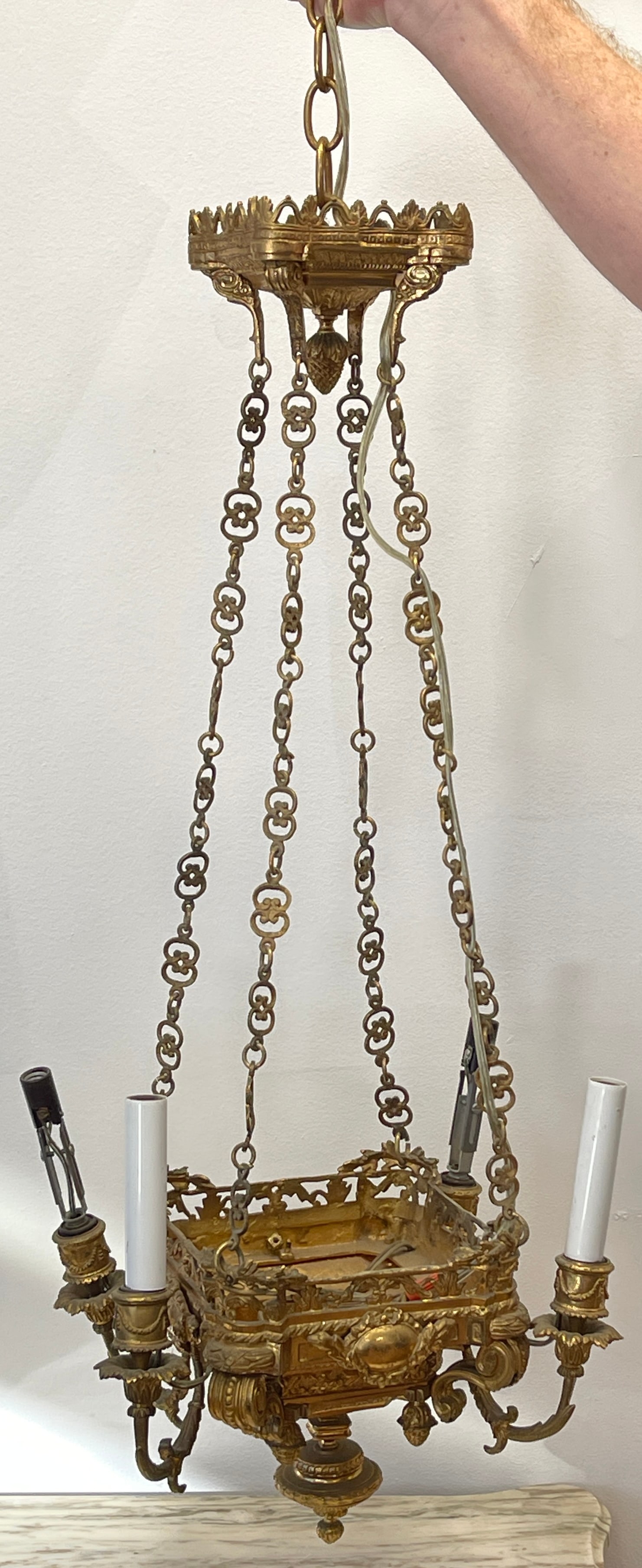 French Dore Bronze Hallway Fixture: Four light, missing two candle covers. Measures 30 long, 12 inches x 9 inches. Overall good condition.