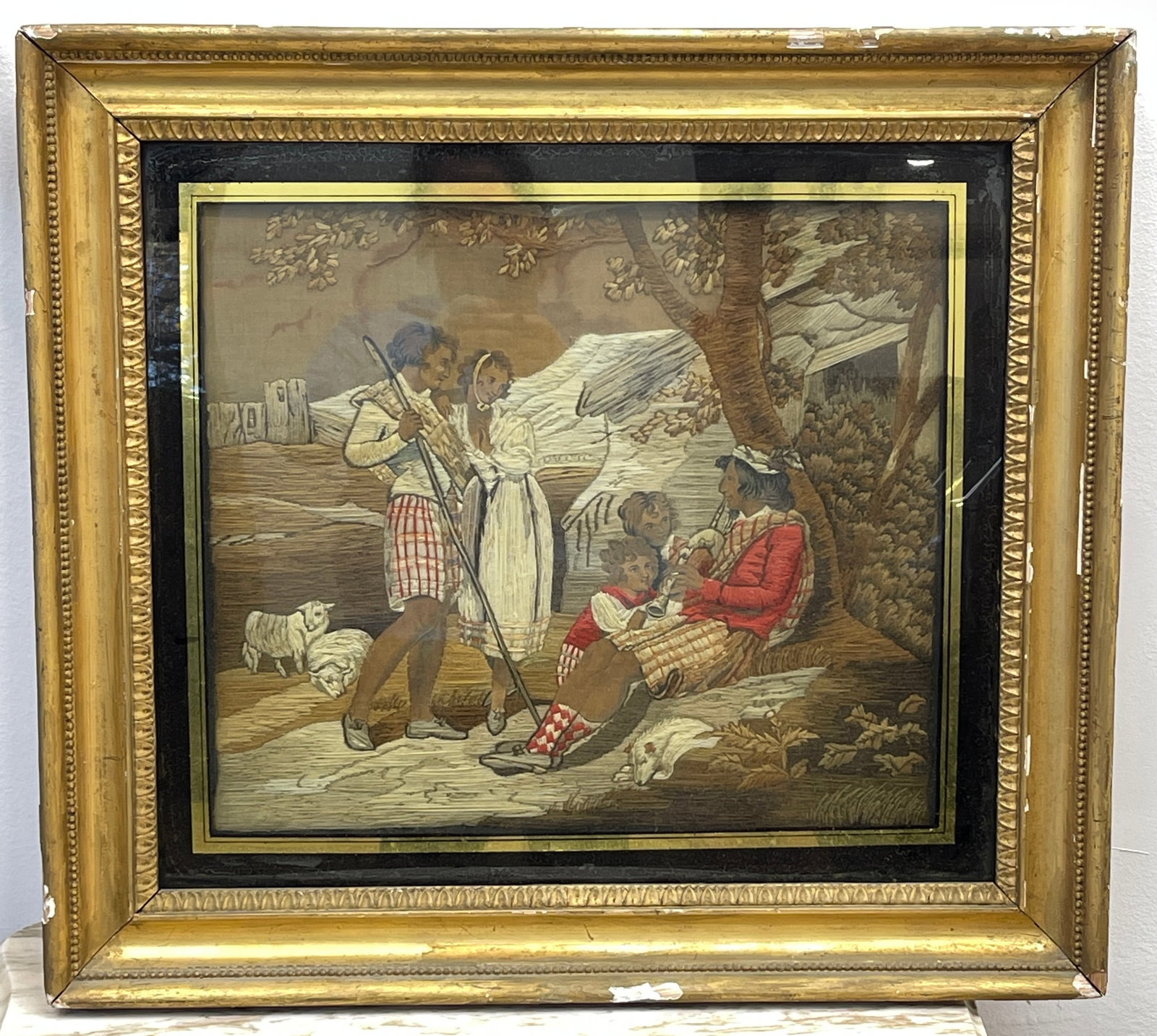 English 19th Century Needlework and Hand Painted Silk In Frame: This exceptional needlework dates to the early 19th century and is a master class in the art of needlework. It incorporates many different types of thread and complicated stitches combined with hand p