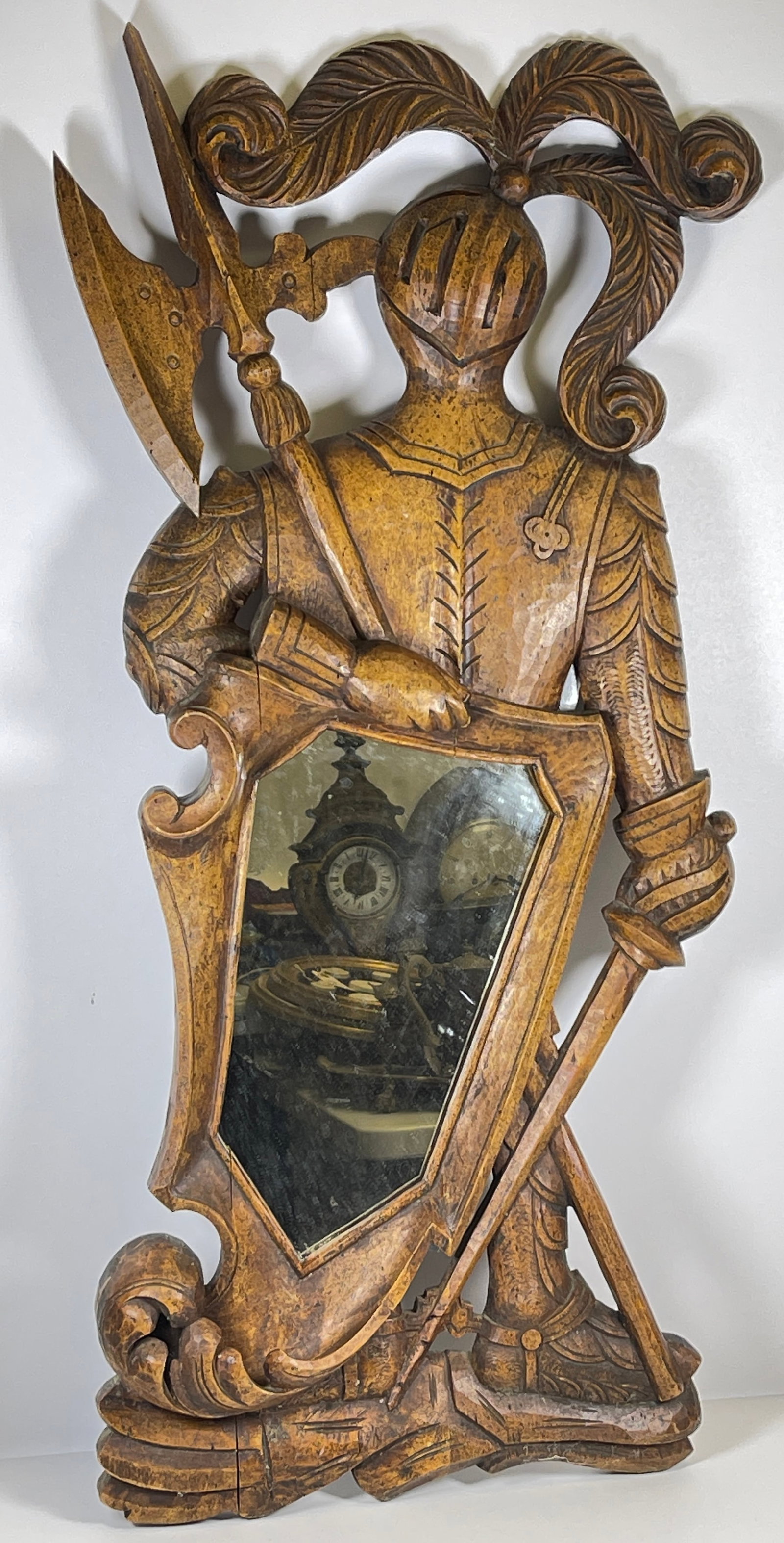 Hand Carved Wood Knight Conquistador Wall Mirror: Carved from solid wood, marked "Made in Spain". Mirror measures 31 inches high, 13 iches wide, about 2 inches deep. Overall good condition, please see photos.