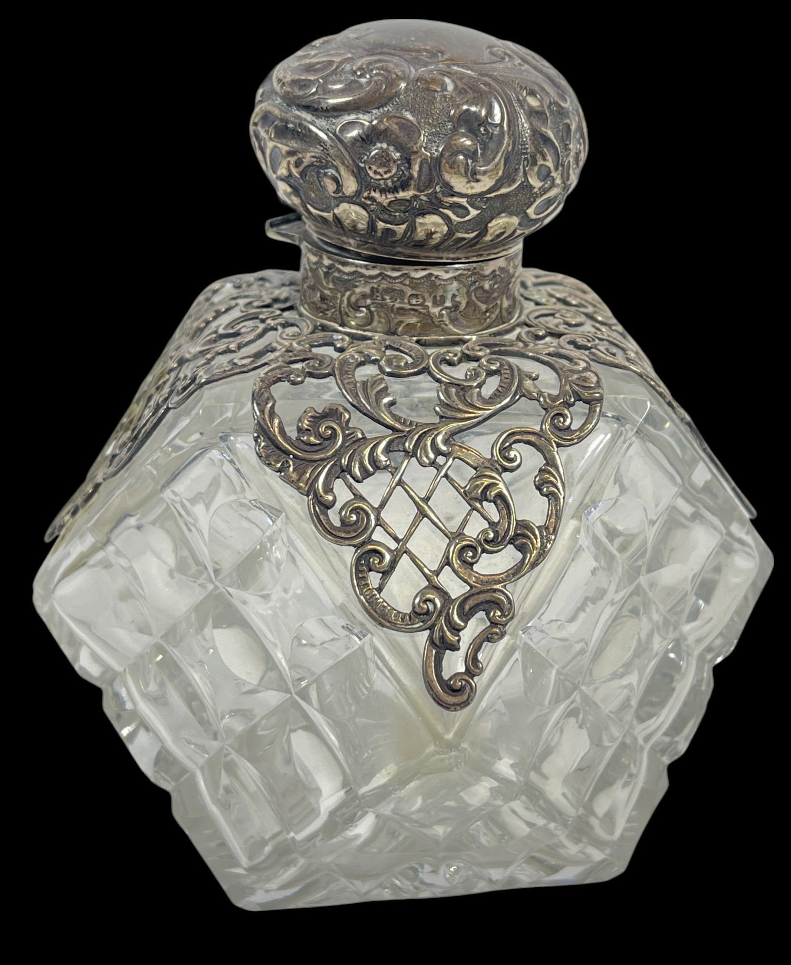 c1905 English Cut Crystal & Reticulated Sterling Silver Collar Perfume: Cut crystal bottle with original inner stopper. No chips or cracks. Silver marked Birmingham, lion passant, letter f for 1905, maker Horton & Allday. Overall good condition, missing pin to hold the ca