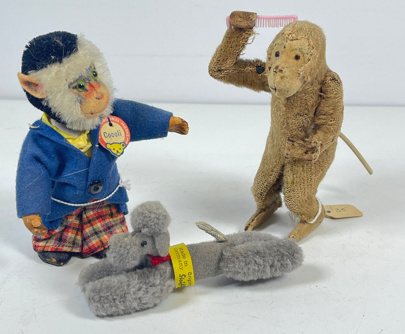 Lot of 2 Steiff & 1 Pompadour Pete Animals: Steiff poodle is wool, Cocoli baboon is dressed. Pompadour pete is missing mirror and fur on tail. Overall fair condition, please see photos.