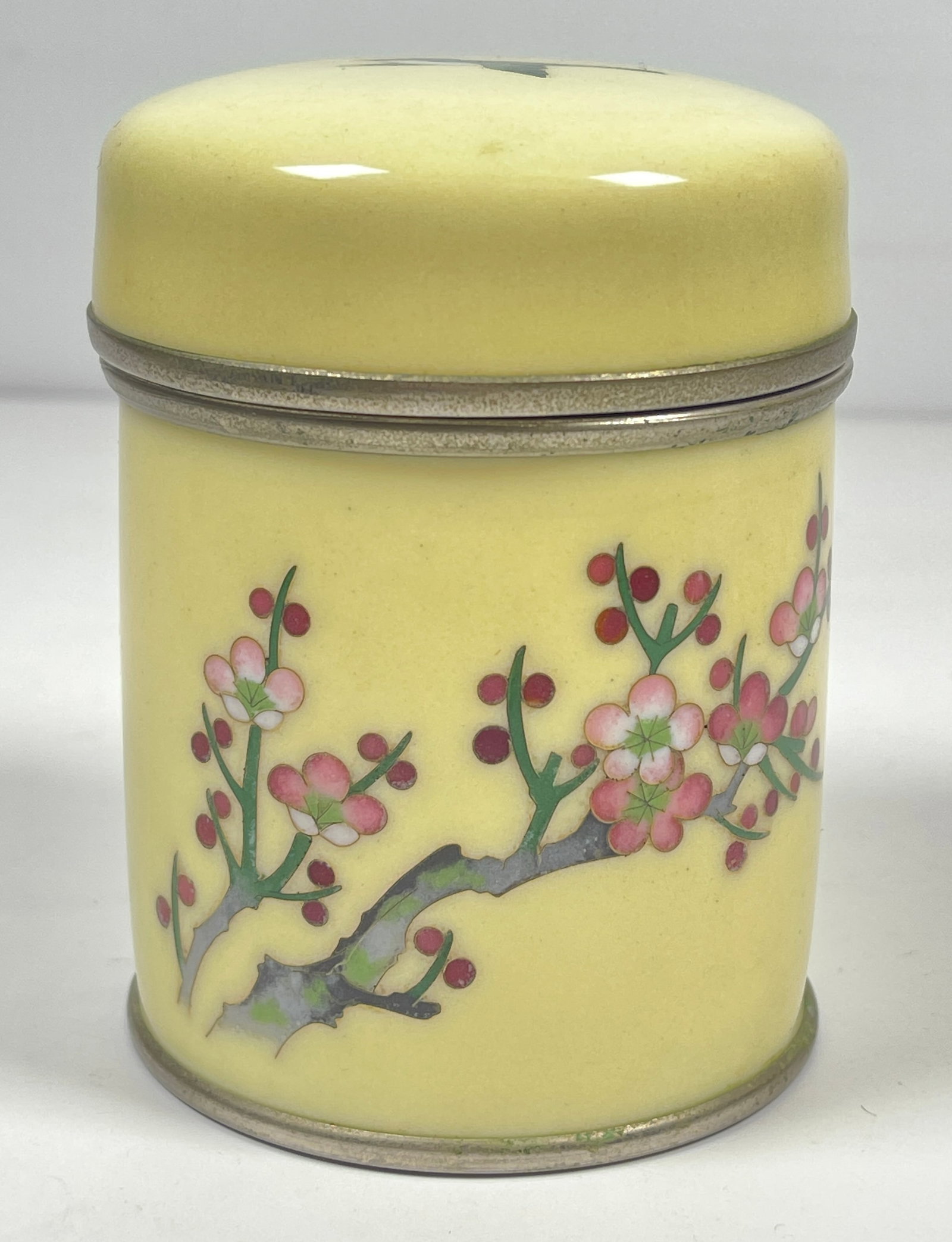 Vintage Asian Cloisonne Covered Jar: Yellow ground with dogwood flowers. Jar measures 4 inches high, 3 inches in diameter. Overall good condition, please see photos.