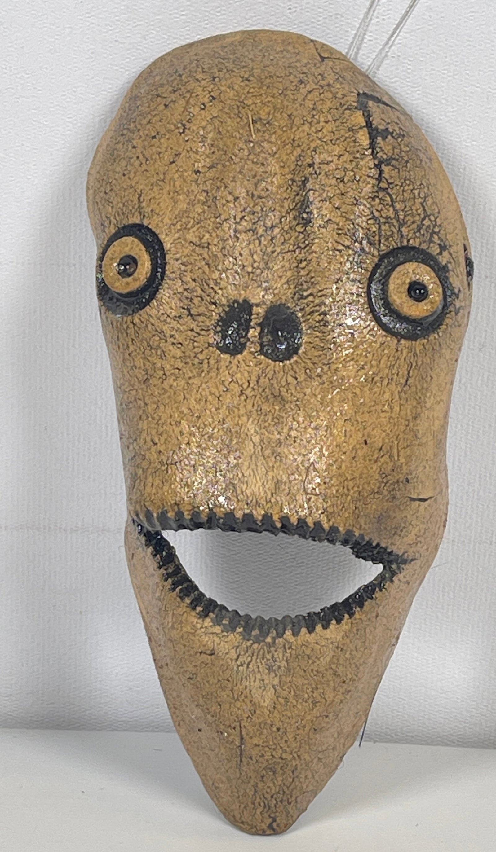 Vintage Chris London Ceramic Tribal Mask: Vintage Chris London ceramic mask, wall hanging. While using both porcelain and stoneware clay bodies, Chris London sculpts faces onto antique rakes, hand builds slabs into masks and platters, or pinc