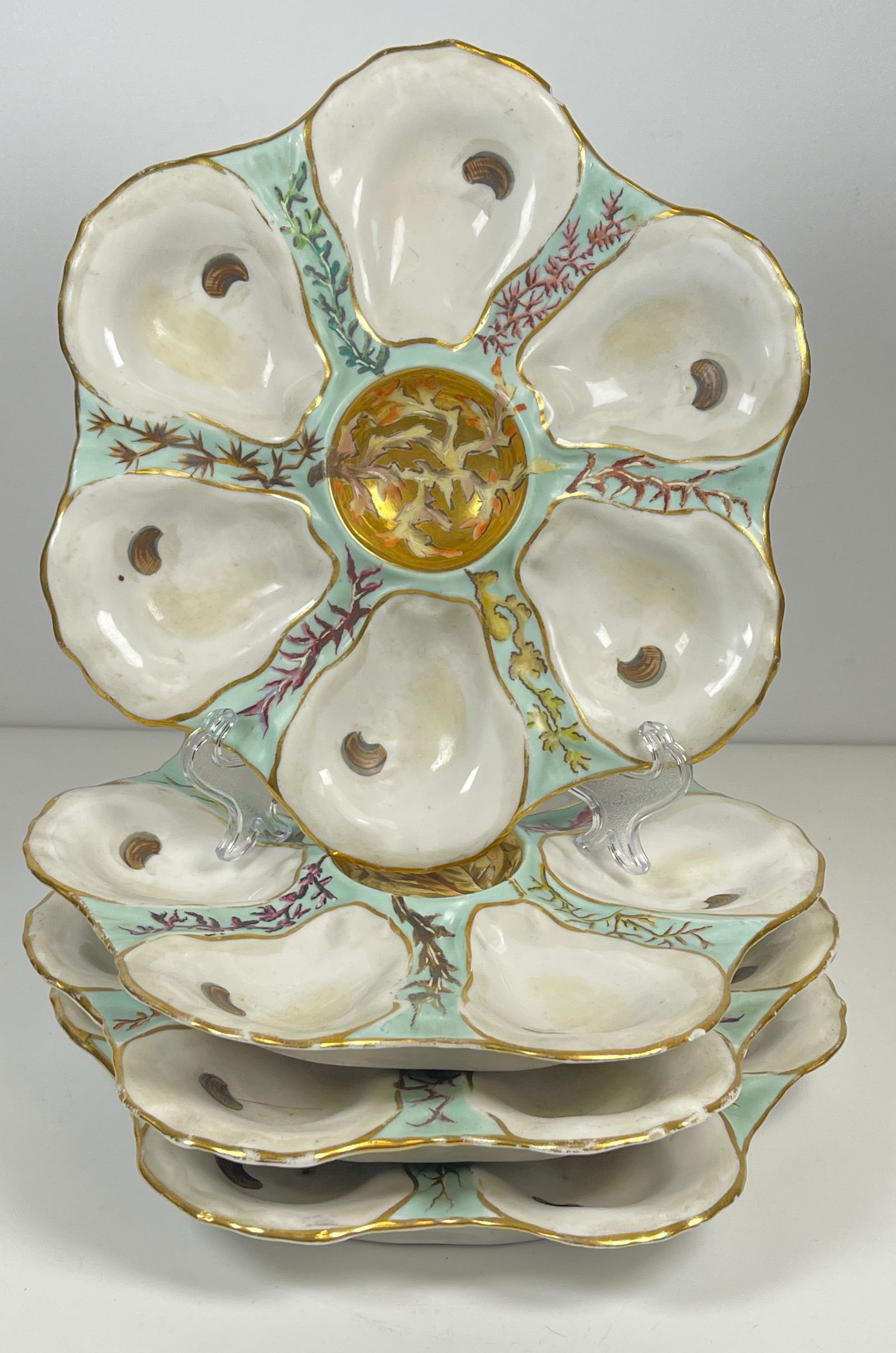 19th Century Set of 4 Hand Painted Porcelain Oyster Plates: Plate measures 9 inches in diameter. Unmarked. Overall good condition, one plate has a small chip, please see photos
