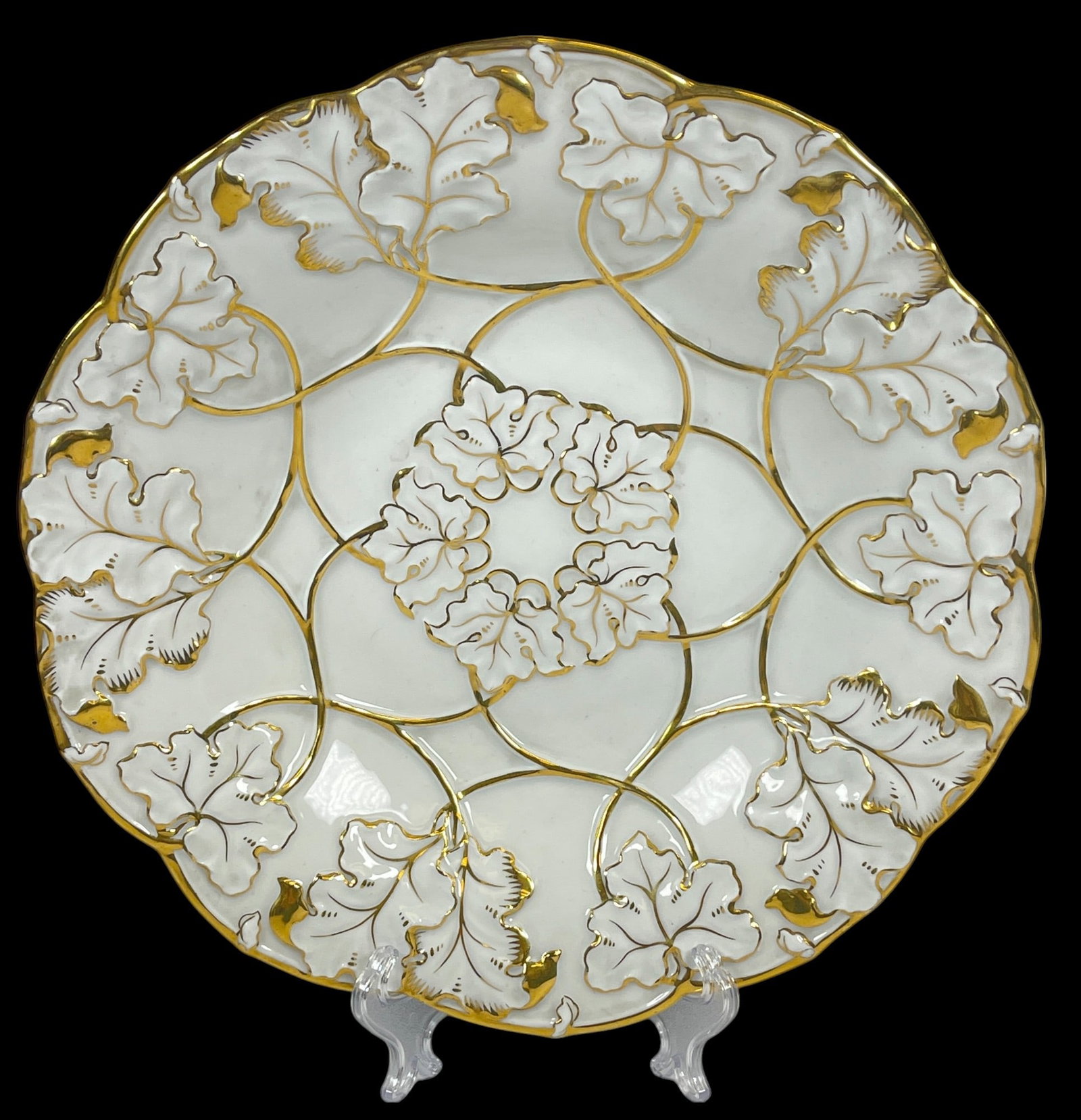 Meissen Gilt Porcelain Leaf Decorated Bowl: Meissen mark on the bottom, bowl measures 2 inches high, 11 inches in diameter. Overall very good condition, no chips or cracks.