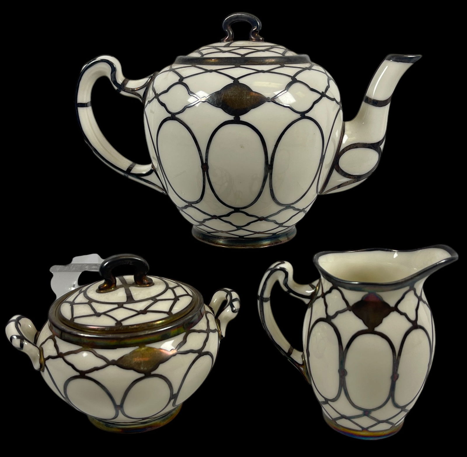 (3 Pc) Lenox Porcelain & Mauser Sterling Overlay Tea Set: Circa 1910 (3) Piece Art Nouveau Lenox Glazed Porcelain Tea & Service with Sterling Silver Overlay, sugar and creamer with Lenox L (1906-1930) and Mauser Manufacturing (NYC silversmiths, 1887-1912) ma