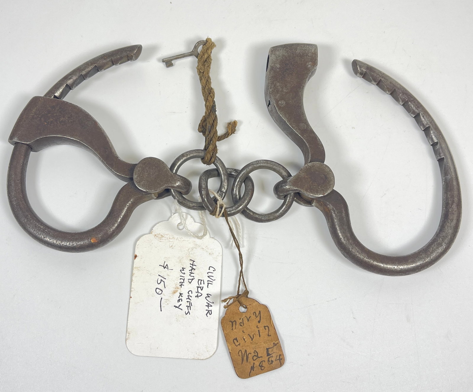 Civil War Era Adams Handcuffs With Key: 1860's Adams Handcuffs and come with the key. Overall good condition with some surface wear.