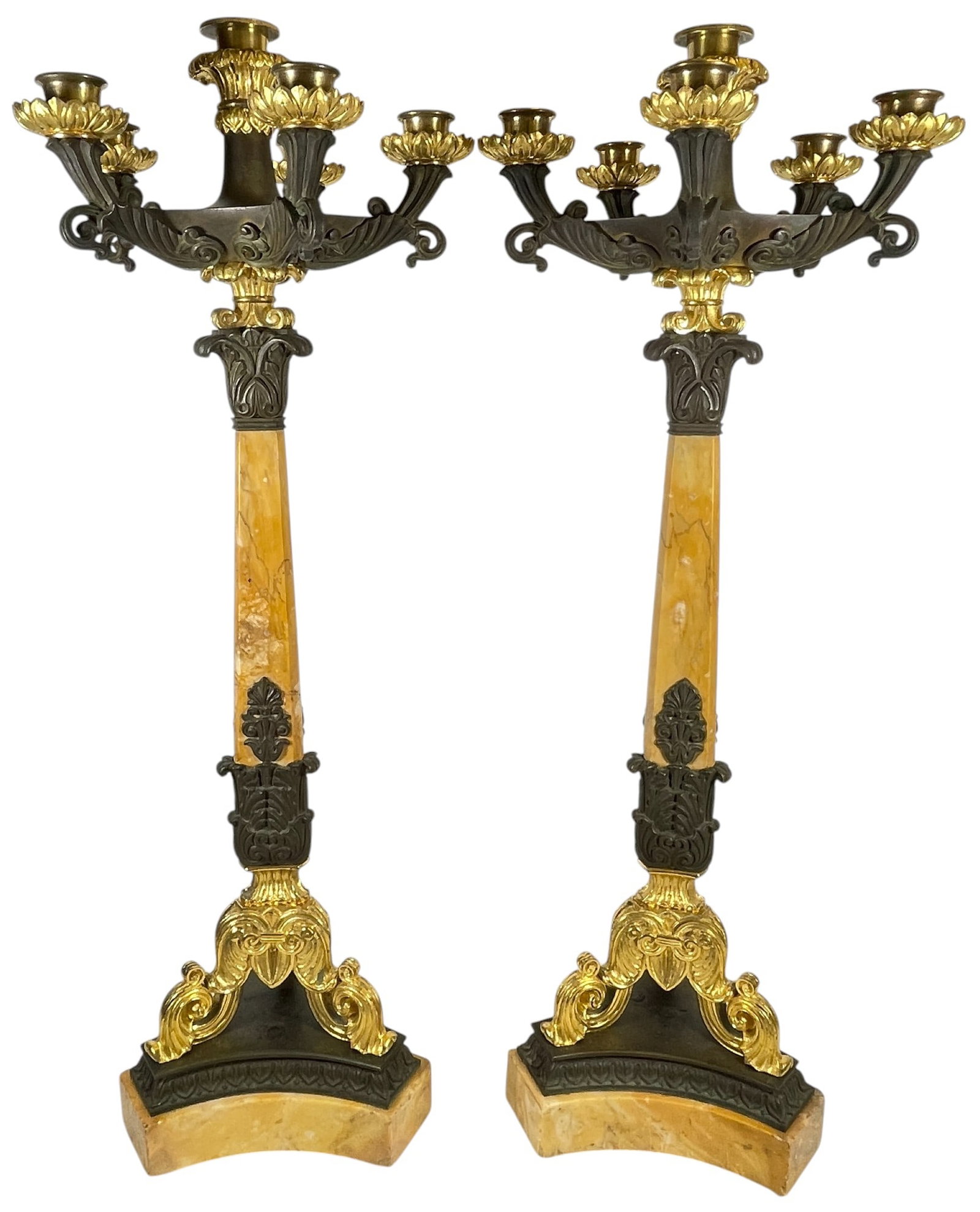 Pair French Empire Two Toned Bronze & Siena Marble Candelabras: Dore and patinated bronze with siena marble column and base. Measure approx 25.25 inches high, 6 inches across the base. Overall fair condition, a break and repair to the marble, please see photos.