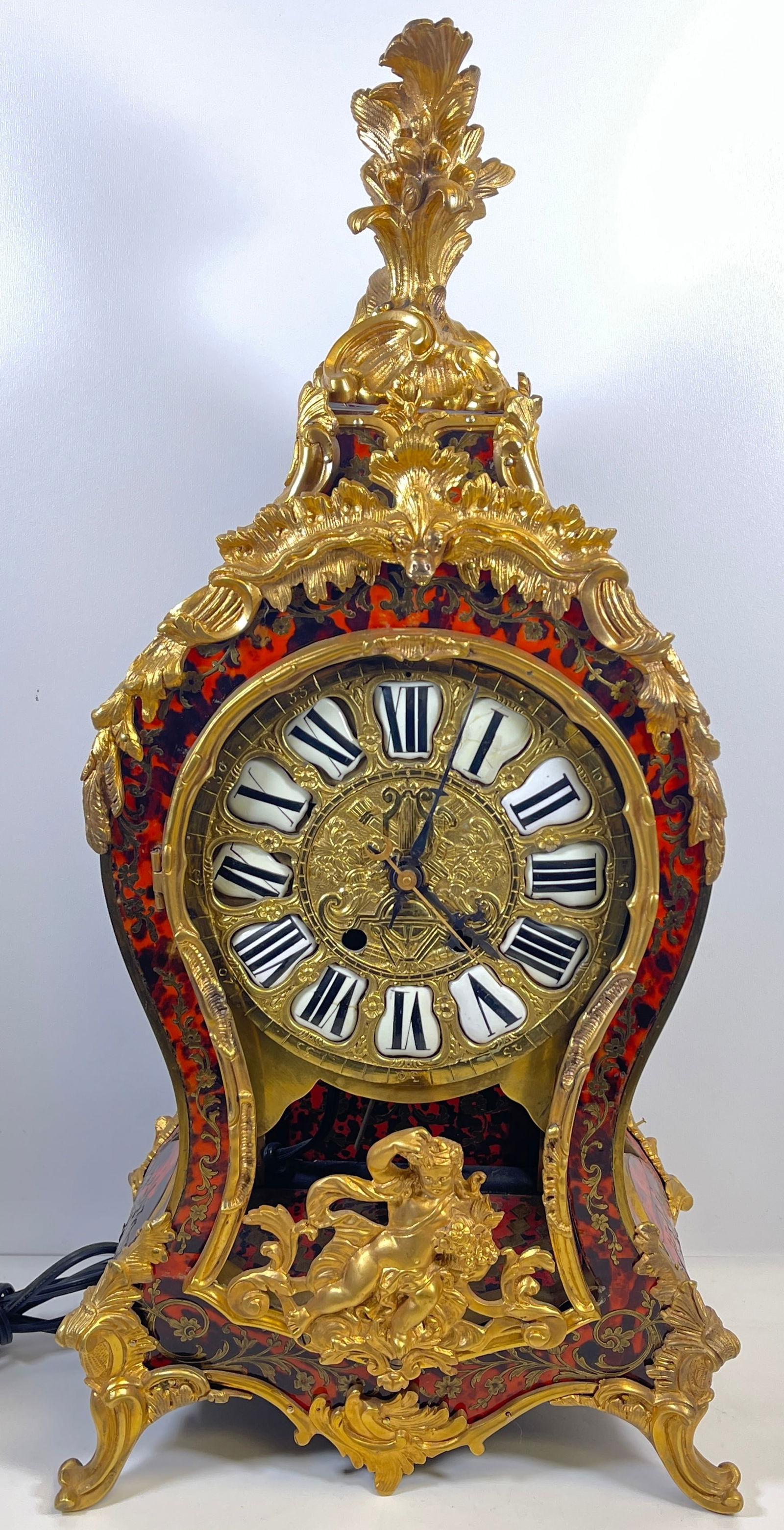 19th Century French Dore Bronze & Boulle Inlaid Mantle Clock: Overall fair condition, clock has been electrified, missing glass for front door and hinge is loose. Clock measures 25 inches high, 12 inches wide, 6.5 inches deep.