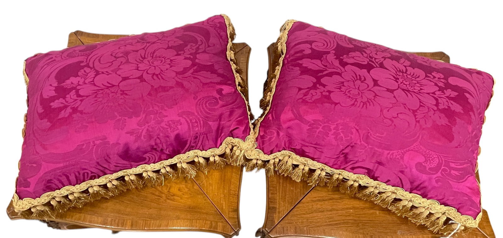 Pair of Antique French Fushia Silk Damask Pillows: Gold trim and tassels. Measure 23 inches x 16 inches. Overall good condition.