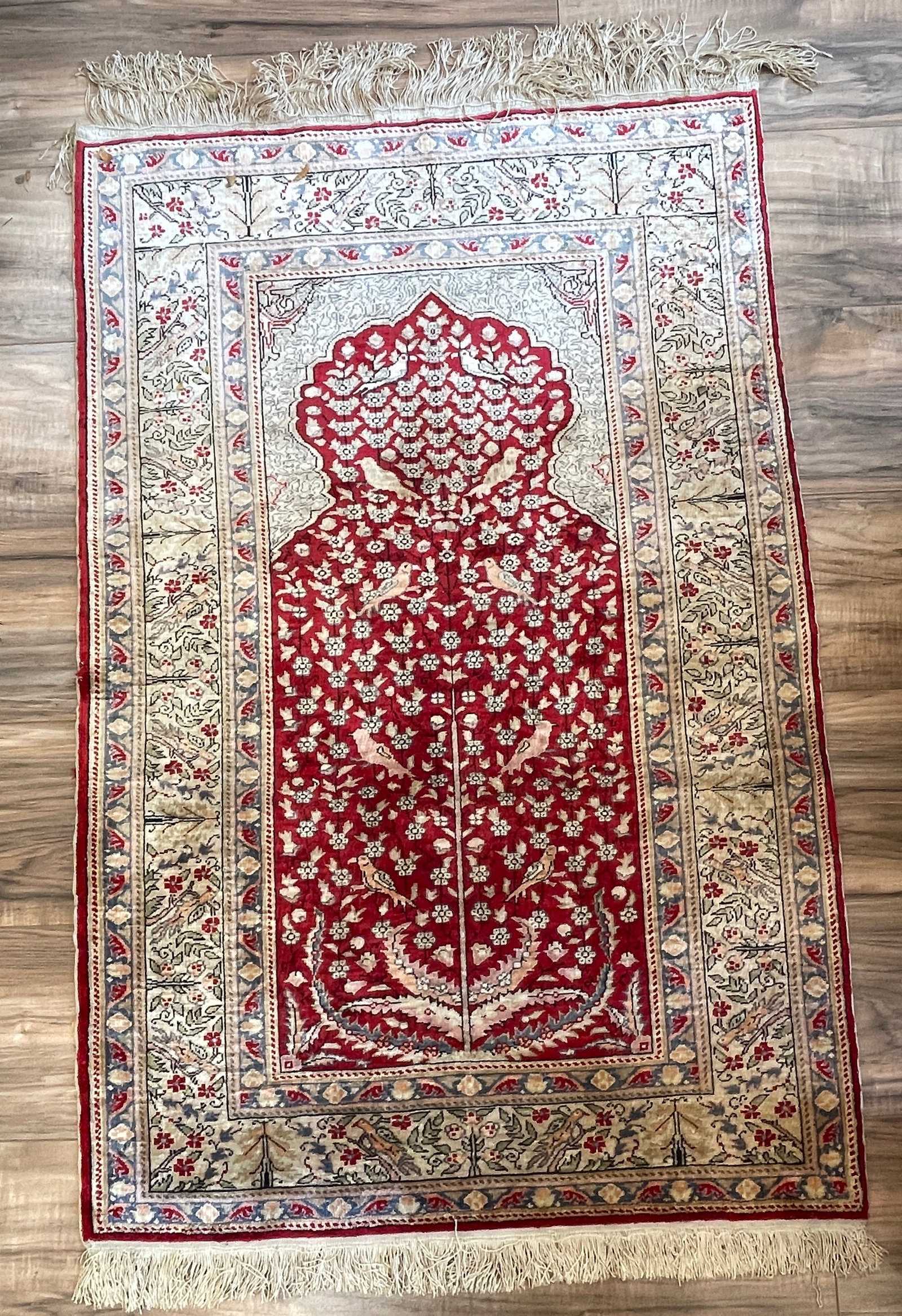 Handmade Silk Tree of Life Prayer Rug: Red background. Rug measures 43 inches x 28 inches. Overall good condition.