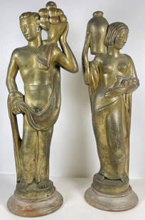 Art Deco Bronze Clad Statues Kupur: Pair of art deco bronze clad statues, each stylized figure holding a jar and cornucopia, signed "Kupur" on base. Measures 20.25 inches high. Overall good condition, see photos.