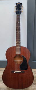 Early c. 1950s LGO Gibson 6 String Acoustic Guitar: Early Vintage Gibson c. 1950s Acoustic Guitar with the original Gibson case. Frets look good with minimal wear. Bridge and fingerboard appear to be Brazilian Rosewood and in excellent condition for th