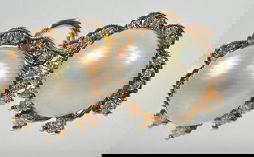 14k Yellow Gold Diamond & Pearl Earrings: Marked 585 and 14k, pearl measures 10mm, approx .75 carats of diamonds each. Total weight 8.0 dwt, 12.5 grams.