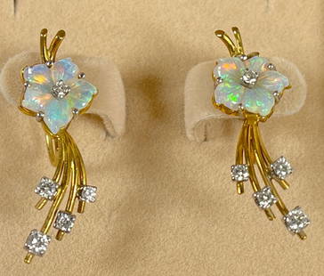 Art Nouveau 18k Yellow Gold Diamond & Carved Opal Earrings: Screw back earrings marked 18k on the back of the screw, with opal shaped in a flower, a diamond in the center and diamond spray underneath. 5 diamonds on each earring. Measure 1.25 inches long and we
