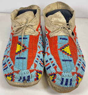 Pair of Plains Native American Fully Beaded Moccasins: Each measure 11 inches long x 4.5 inches wide. Overall good condition, some beads missing, please see photos. Please ask questions as we are not experts in native american. Comes from a prolific colle