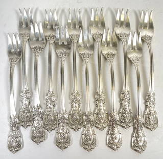 (12) Reed & Barton Francis I Sterling Silver Oyster Forks: Measure 5.625 inches long, total weight 270.5 grams (8.7 ozt)