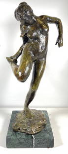 Edgar Degas (French, 1834 – 1917) Bronze Dancer: Edgar Degas (French, 1834-1917) Titled "Dancer Looking at Her Right Foot". Stamped "Degas" with stamped "Cire Purdue A A Hebrard" behind the leg. Conceived in wax circa 1882-95 and cast in bronze by t