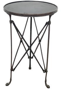 Manner of Eichholtz Silver over Bronze Marble Top Side Table: Black marble top, (small chip, see photos) inset to silvered bronze table. Table measures 26.5 inches high, 17 inches in diameter across the top. Overall fair condition.