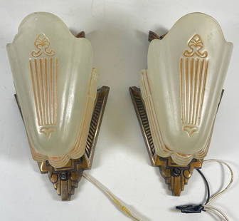 Pair Art Deco Slip Shade Wall Sconces: Pair Antique Art Deco Slip Shade Wall Sconces Circa 1920 with a coppered finish and frosted glass slip shades. Measure 10.5 inches long, approx 5 inches from the wall. Overall good condition, one shad